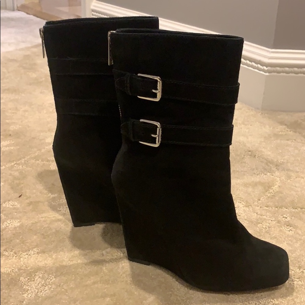 Michael Kor’s Suede black boots.